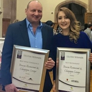 Chris THompson and Serena Macari receiving the awards for Best Restaurant in Derry 2016 and Best Wine Experience 2016
